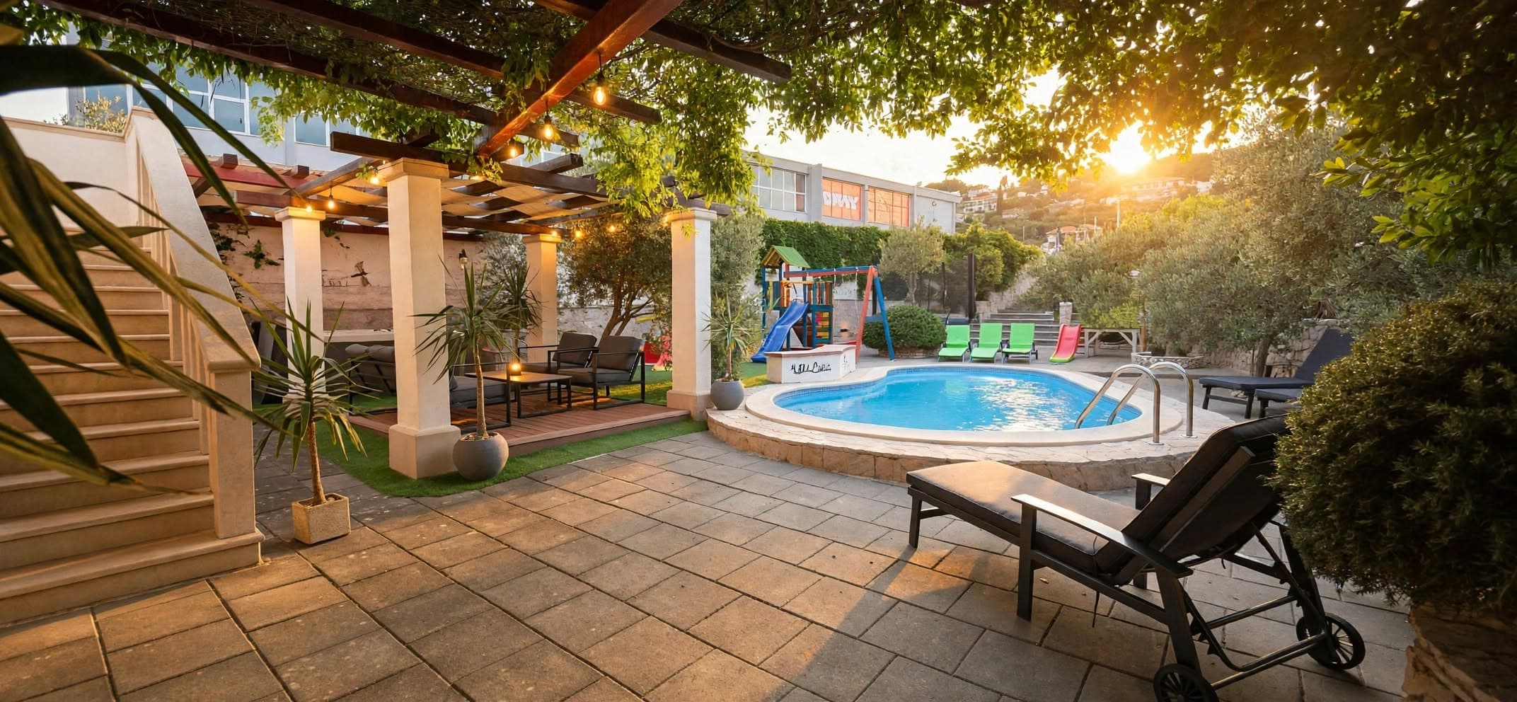 Terrace, pergola and pool at sunset